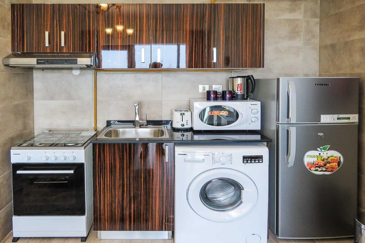Oyo 860 Studio Apartment, Maya Tower 4, Jumeirah Village Triangle ドバイ エクステリア 写真