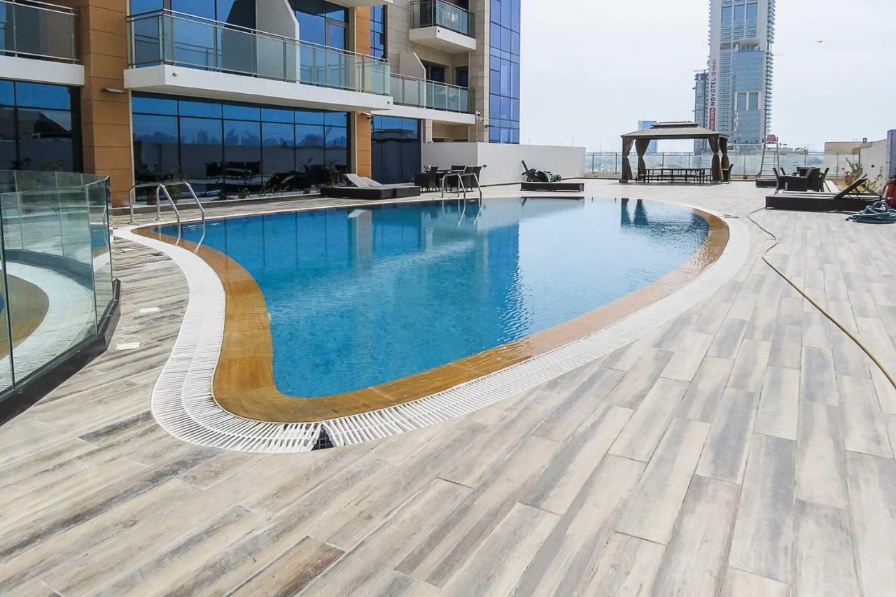 Oyo 860 Studio Apartment, Maya Tower 4, Jumeirah Village Triangle ドバイ エクステリア 写真